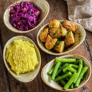 Portobello gevuld met quinoa, vegan feta, spinazie, pijnboompitten en tuinkruiden