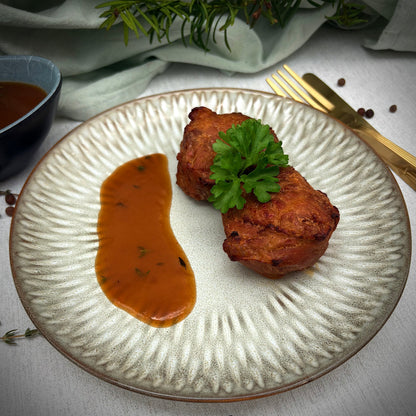 Kalkoenmedailions met sinaasappel-tijmsaus